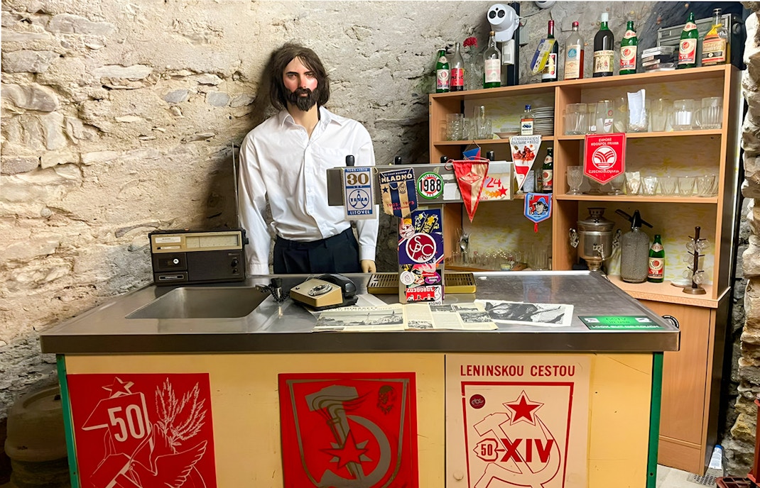 13th-century cellars at Prague Beer Museum, showcasing historical brewing artifacts.