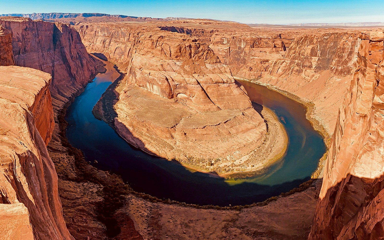 Horseshoe Bend aerial view with Colorado River, part of helicopter tour.