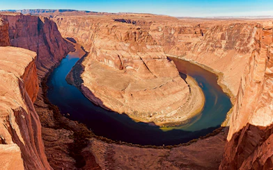 Horseshoe Bend aerial view with Colorado River, part of helicopter tour.