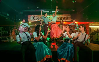Dancers and musicians performing at Celtic Nights show in Dublin.