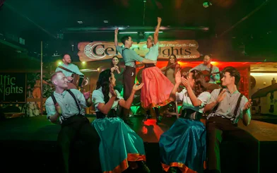 Dancers and musicians performing at Celtic Nights show in Dublin.
