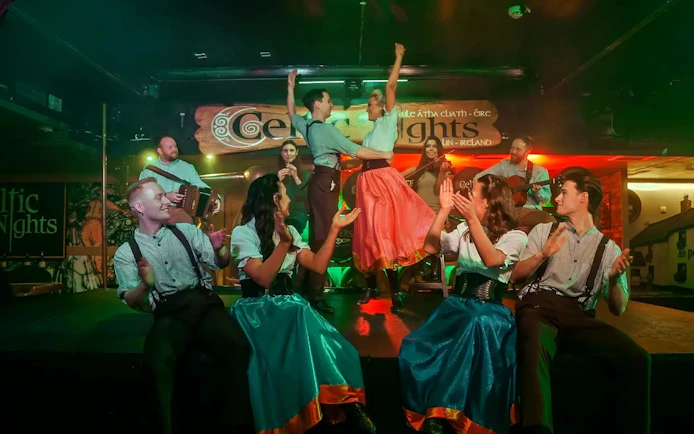 Dancers and musicians performing at Celtic Nights show in Dublin.