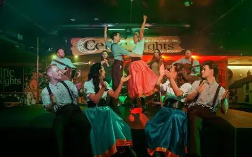 Dancers and musicians performing at Celtic Nights show in Dublin.