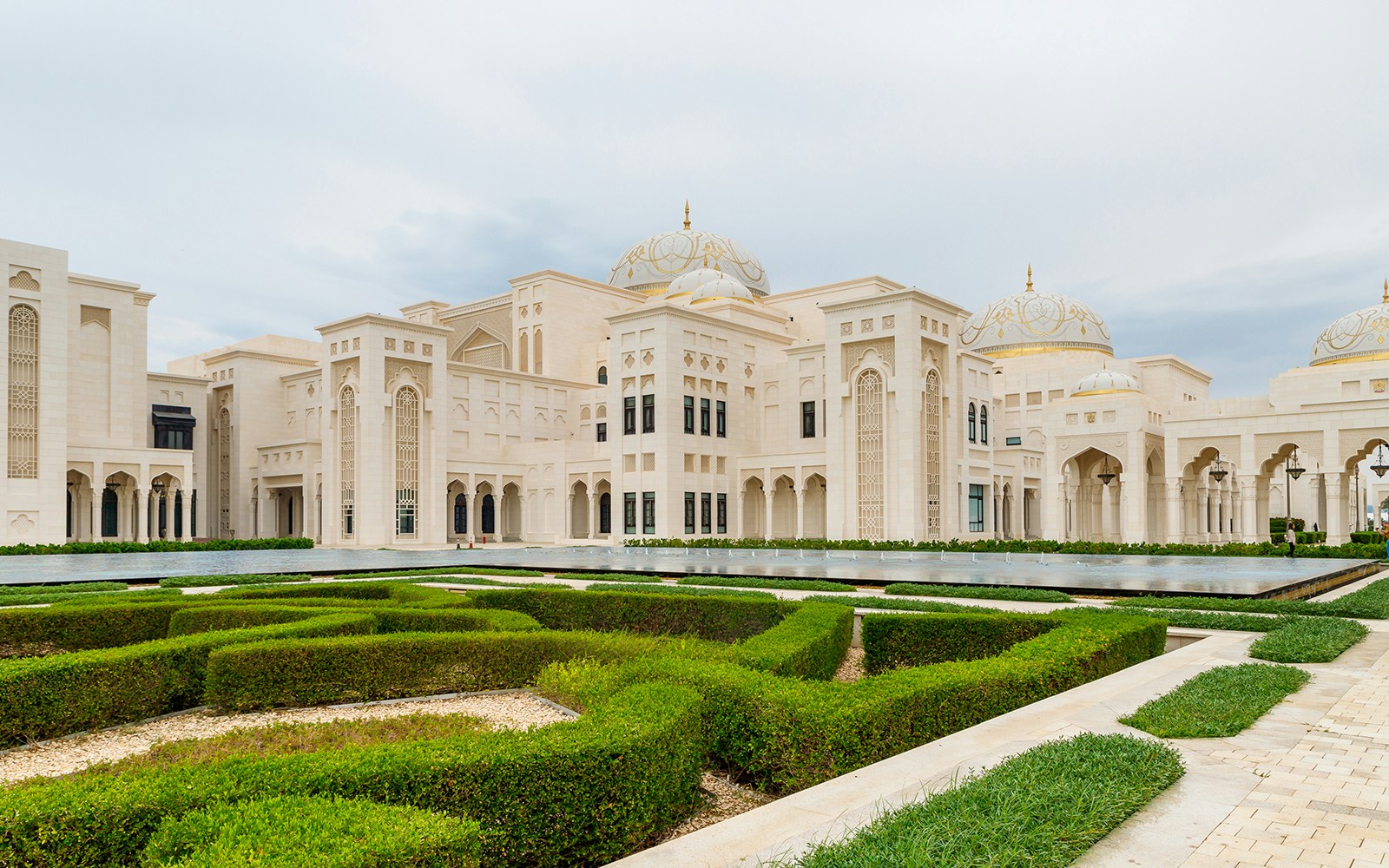Ornamental garden at Qasr Al Watan, Abu Dhabi, featuring intricate landscaping and architectural details.