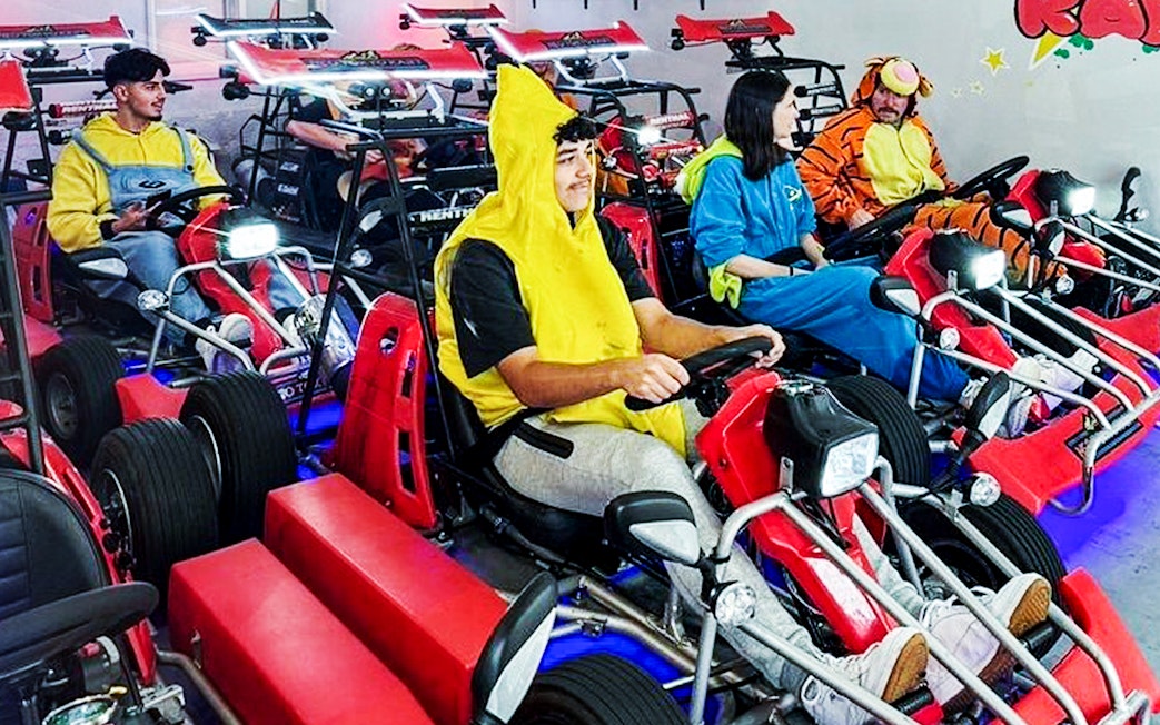 Participants in costumes ready for Shibuya street go-kart experience.