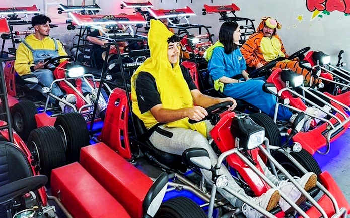 Participants in costumes ready for Shibuya street go-kart experience.