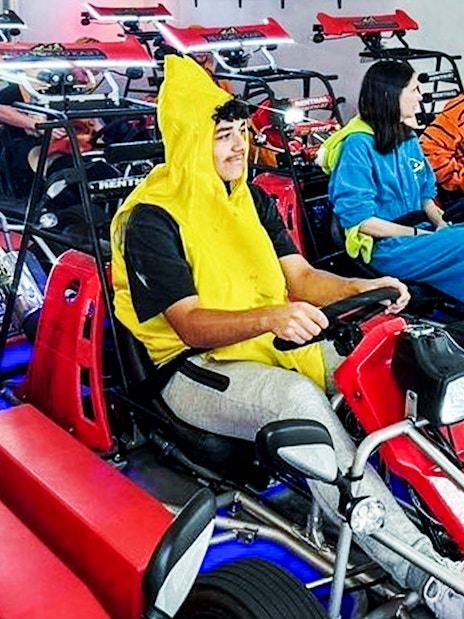 Participants in costumes ready for Shibuya street go-kart experience.