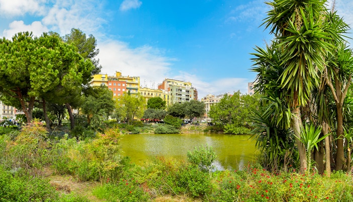 Gaudí Square park with pond and trees near Sagrada Familia, Barcelona.