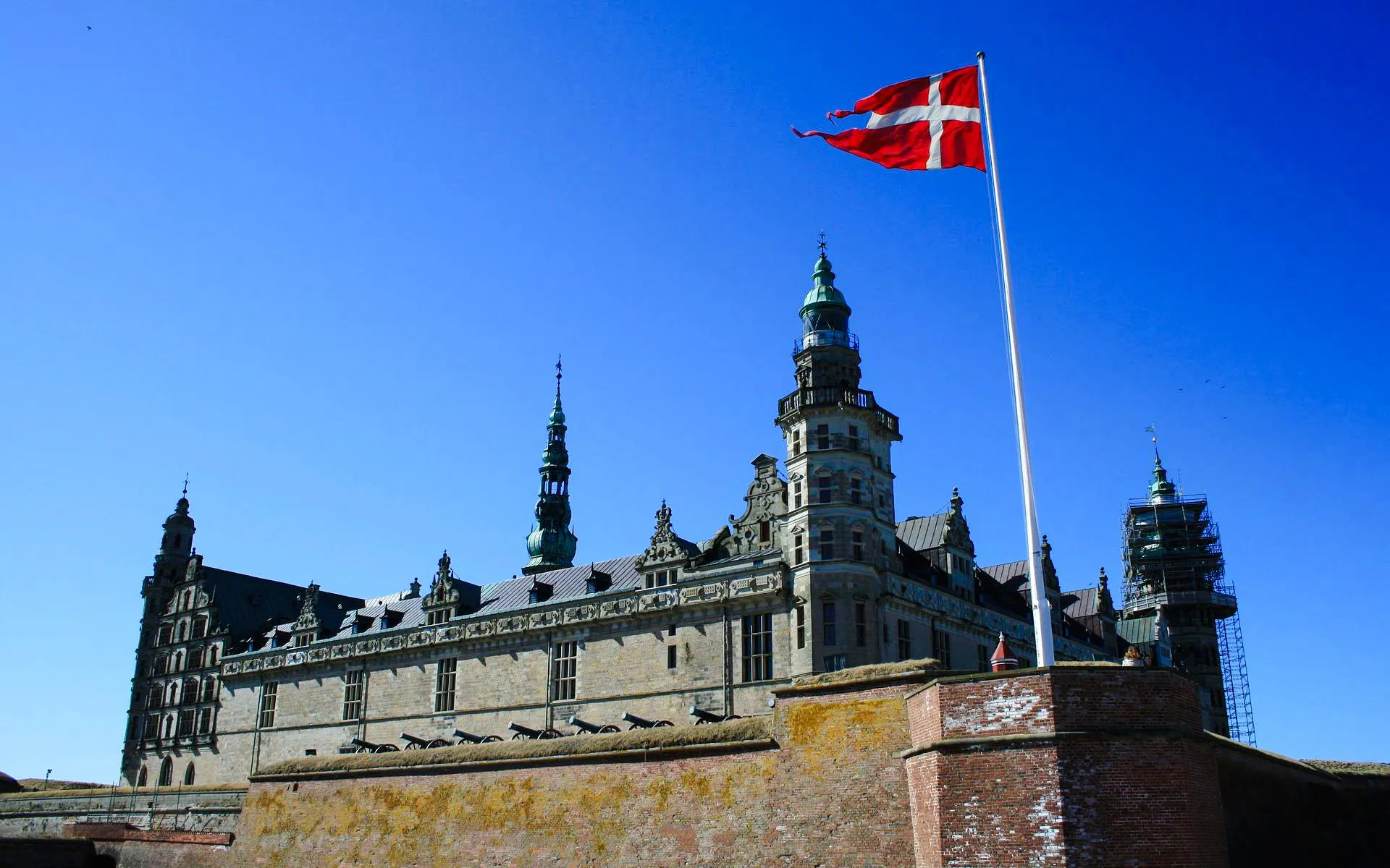 Kronborg Castle with Danish flag, Helsingør, Denmark.
