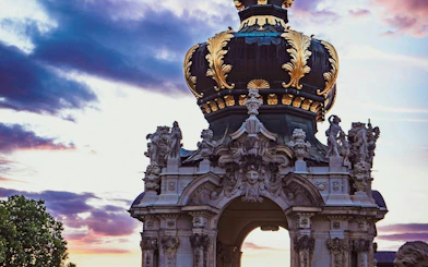 Zwinger Palace crown gate at sunset, Dresden, part of the Royal Ghost of August the Strong tour.