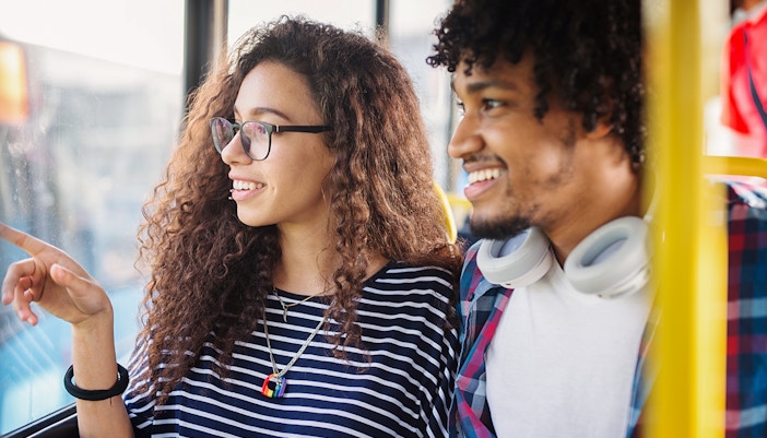 Passengers enjoying a scenic bus tour to Waterbom Bali