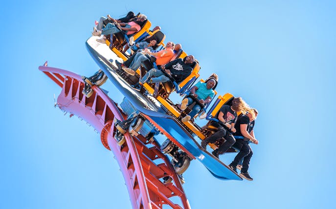 Visitors riding the Georgia Gold Rusher roller coaster at Six Flags Over Georgia.