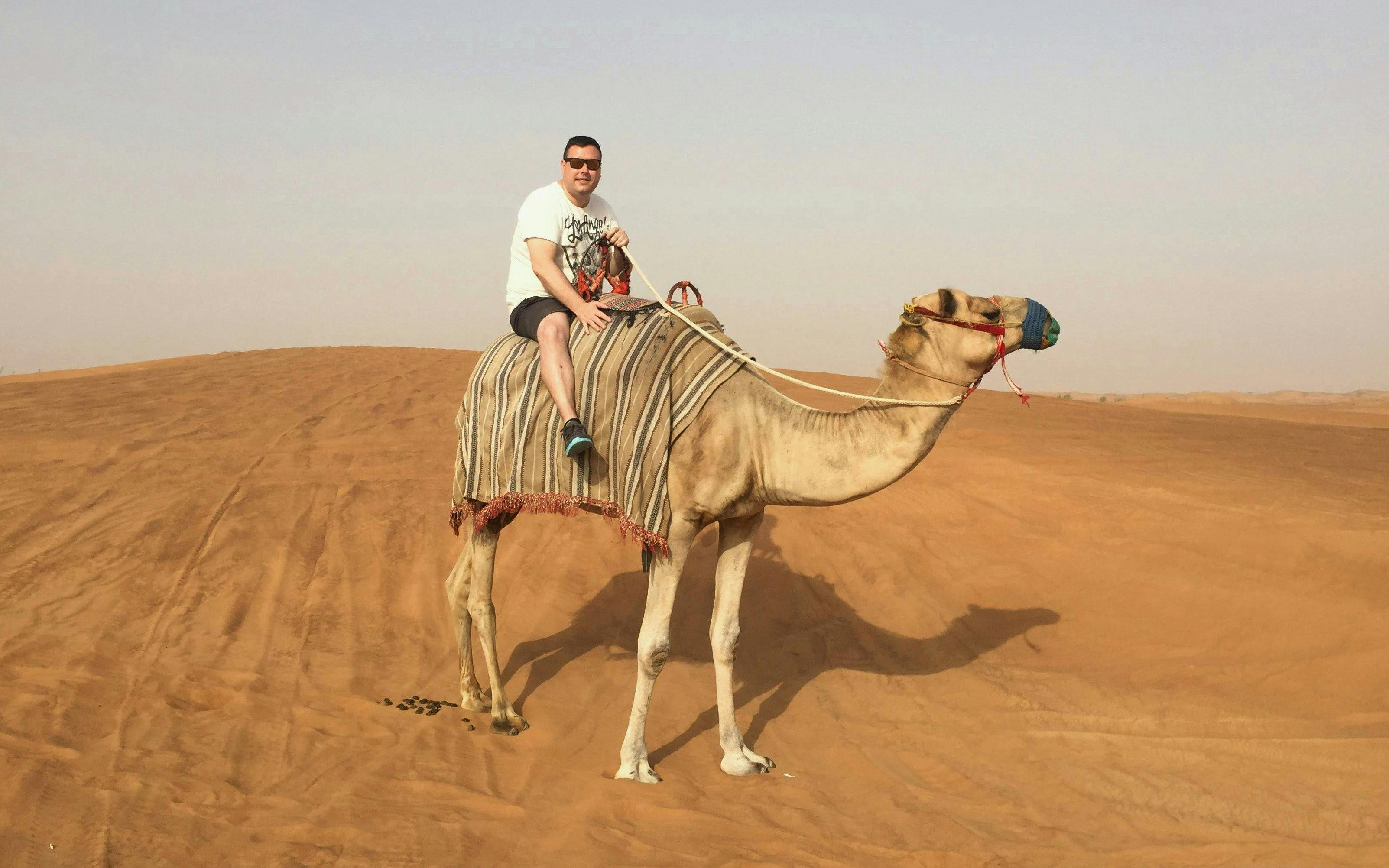 Camel ride on desert dunes near Souss River, Agadir.