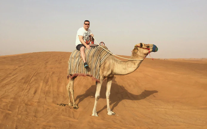 Camel ride on desert dunes near Souss River, Agadir.