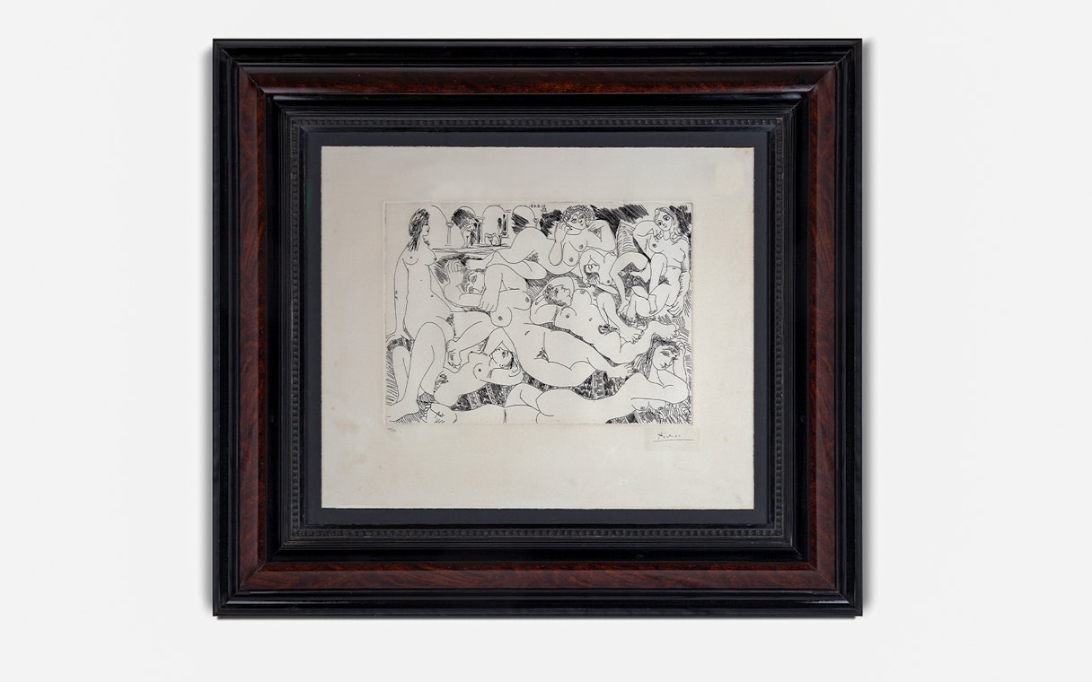 Framed artwork of nude figures at Erotic Museum Barcelona.
