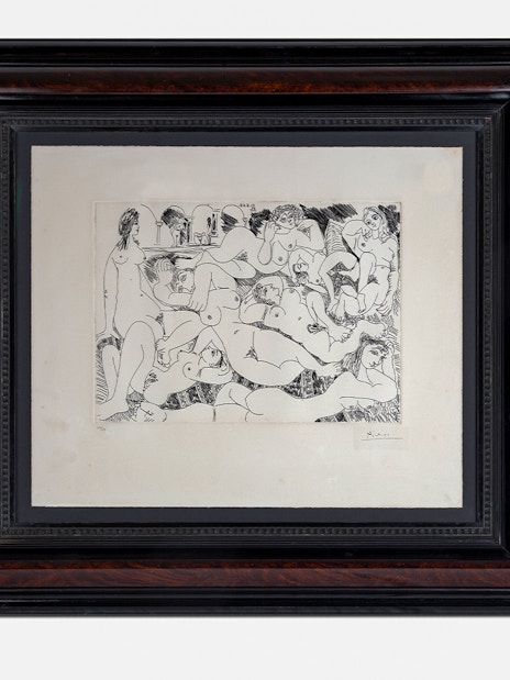 Framed artwork of nude figures at Erotic Museum Barcelona.