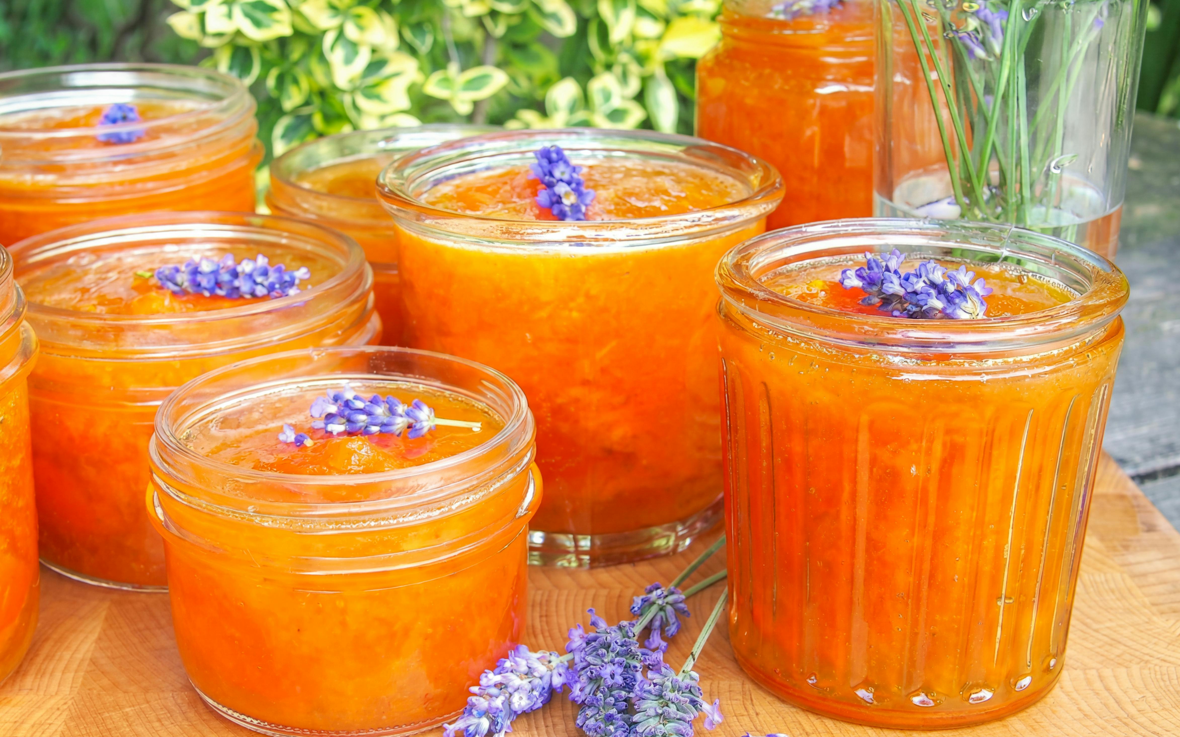 Jars of homemade orange marmalade with lavender flowers, Troodos Mountains gourmet tour.