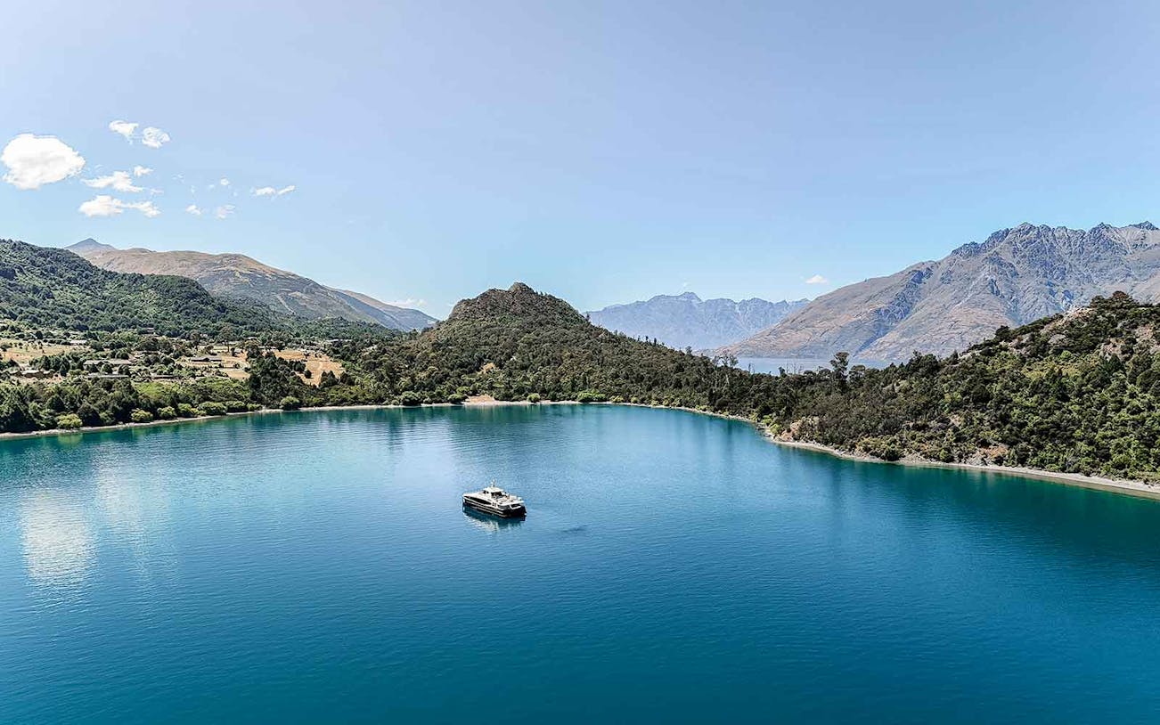 Spirit of Queenstown cruise on Lake Wakatipu with scenic mountain views, New Zealand.