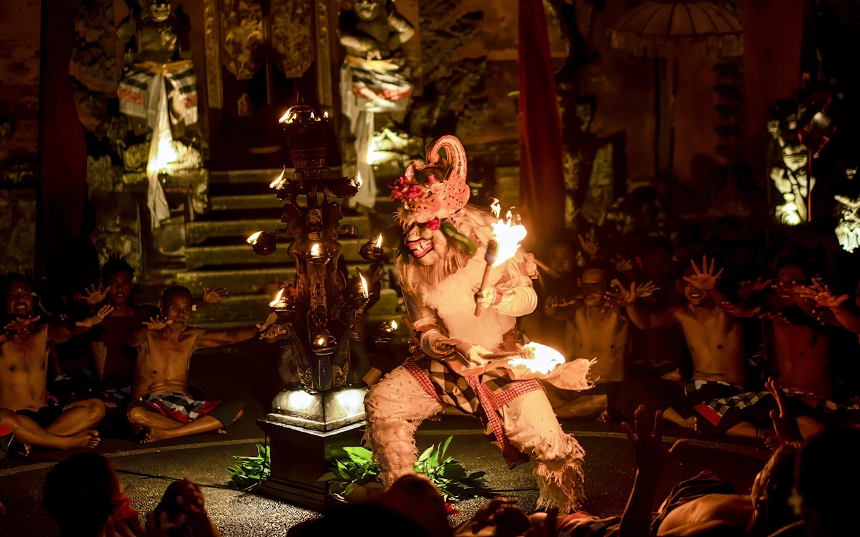 Performer in traditional costume at Kecak & Fire Dance, Ubud Peliatan Palace.