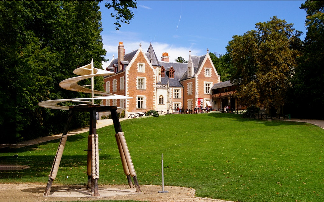 Clos Lucé Castle with Leonardo da Vinci's helicopter model on the lawn.