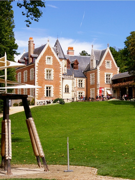 Clos Lucé Castle with Leonardo da Vinci's helicopter model on the lawn.