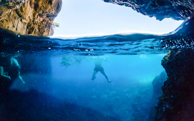 Swimming near blue caves in Dubrovnik, Croatia.
