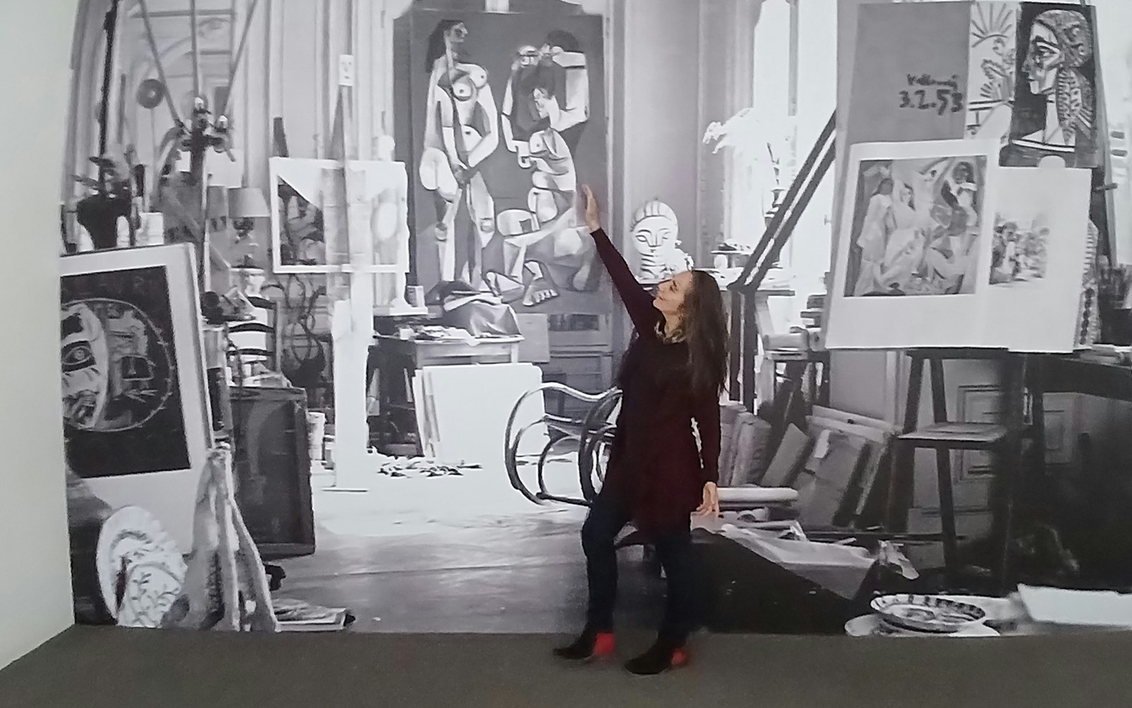 Picasso Museum Paris interior with visitors exploring the historic architecture.