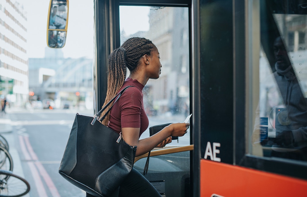 woman getting on metrobus to zoo miami