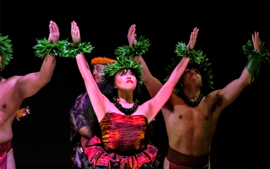 Performers dancing at a traditional Hawaiian luau, Moana Luau, Hawaii.