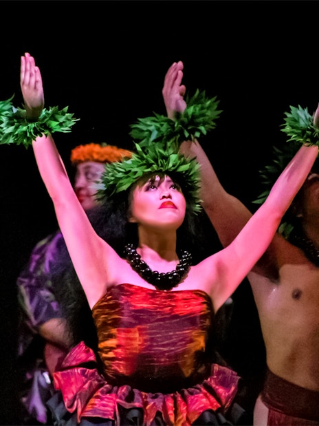 Performers dancing at a traditional Hawaiian luau, Moana Luau, Hawaii.
