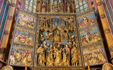 St. Mary's Basilica altar with intricate religious carvings, Krakow Guided Tour.