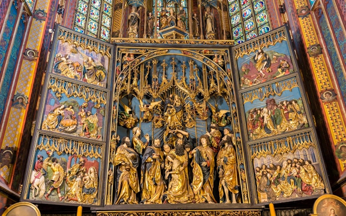 St. Mary's Basilica altar with intricate religious carvings, Krakow Guided Tour.