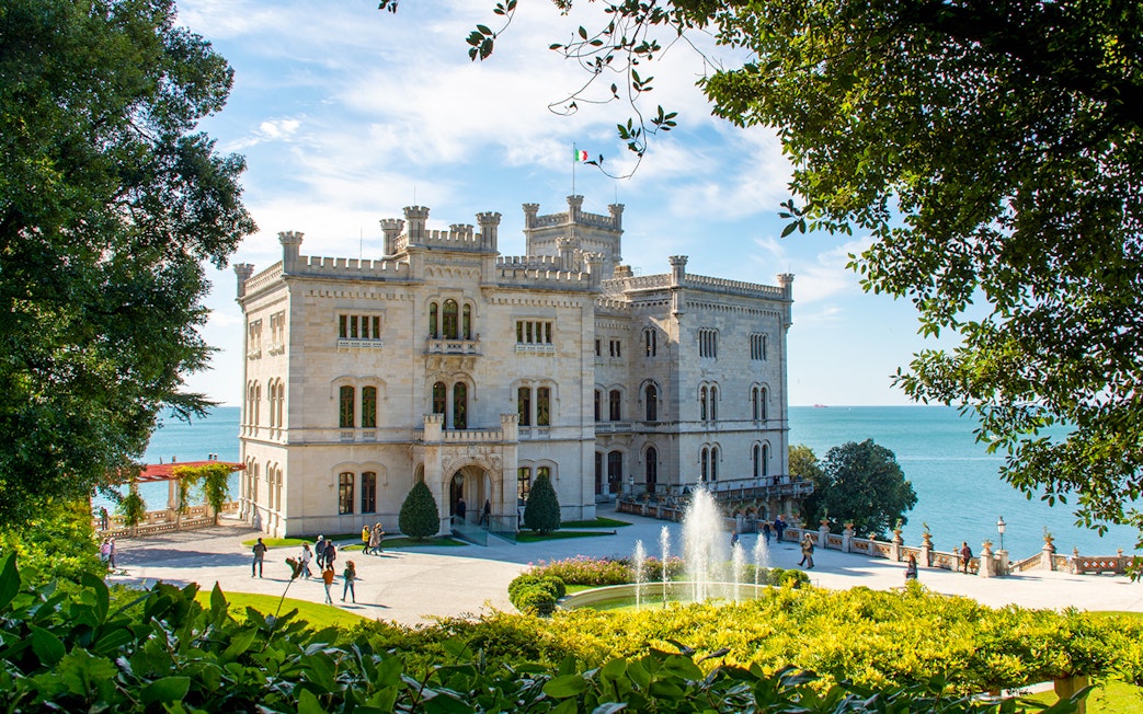 Miramare Castle with gardens and fountain overlooking the Gulf of Trieste on Hoptour.