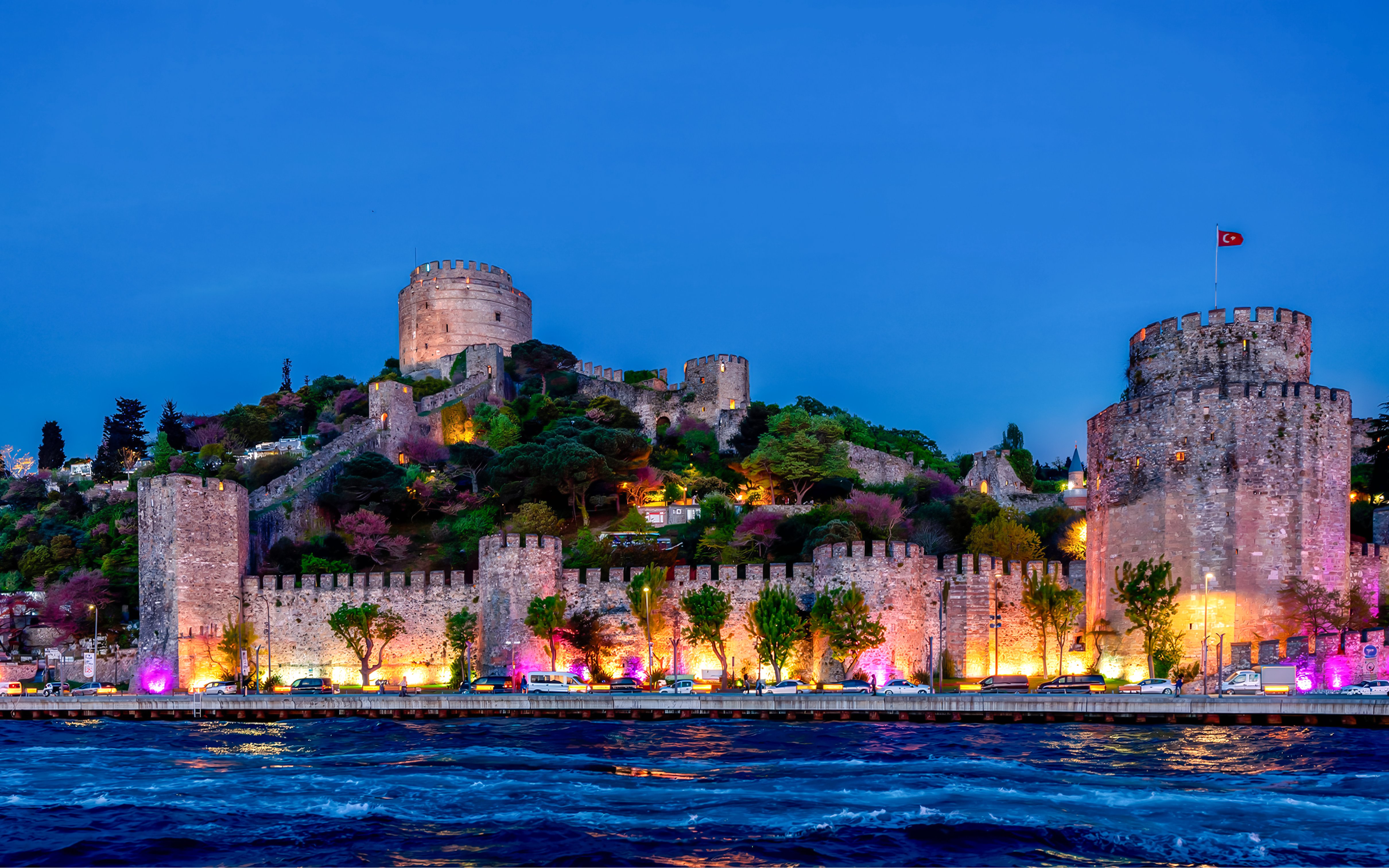 Rumeli Castle illuminated at sunset, Istanbul, Turkey.