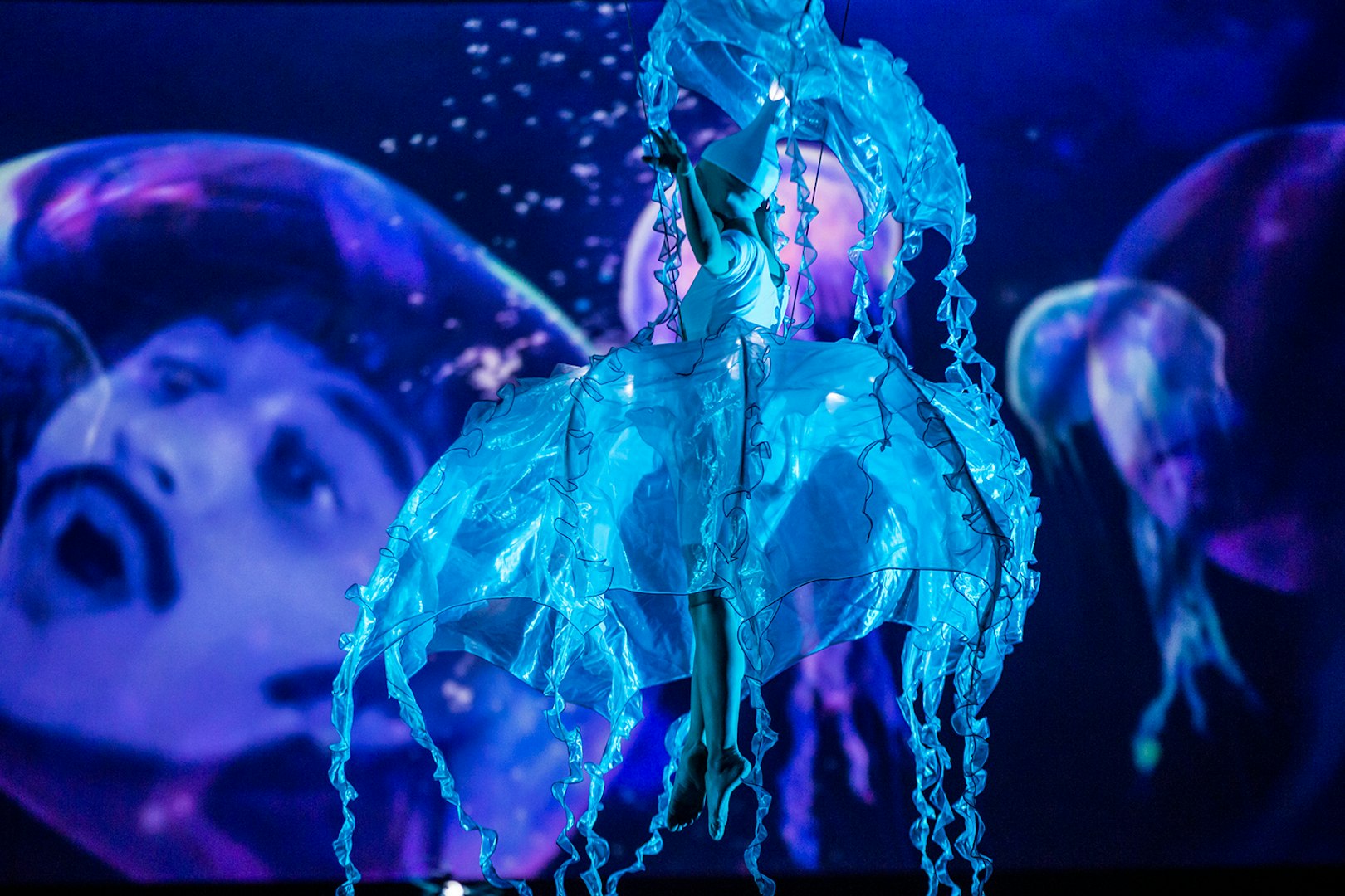 Performer in jellyfish costume at The Beatles LOVE show.
