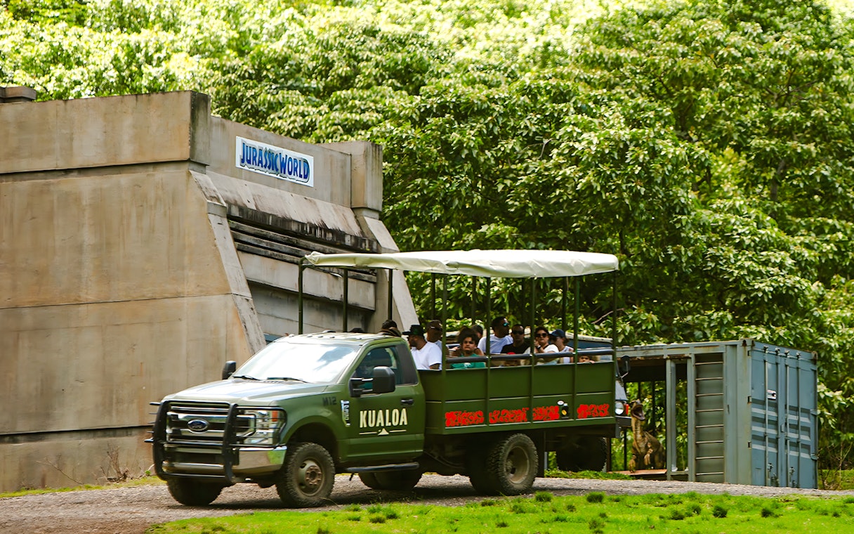 Tour group on a Kualoa Ranch vehicle near Jurassic World set, Jurassic Adventure Tour, Hawaii.