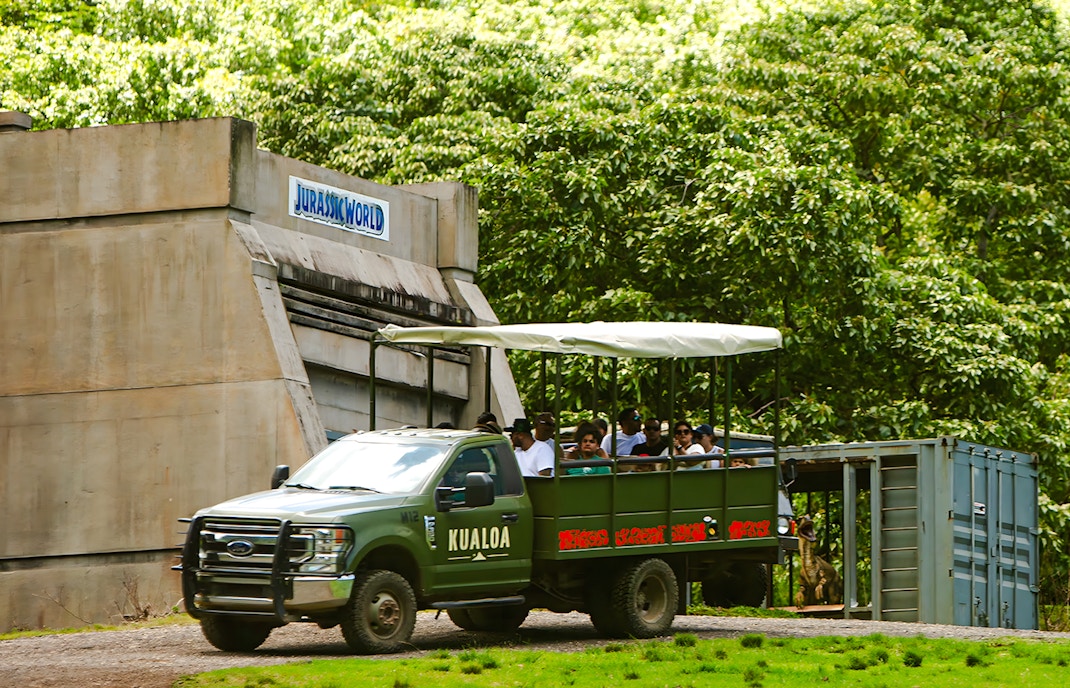 Tour group on a Kualoa Ranch vehicle near Jurassic World set, Jurassic Adventure Tour, Hawaii.