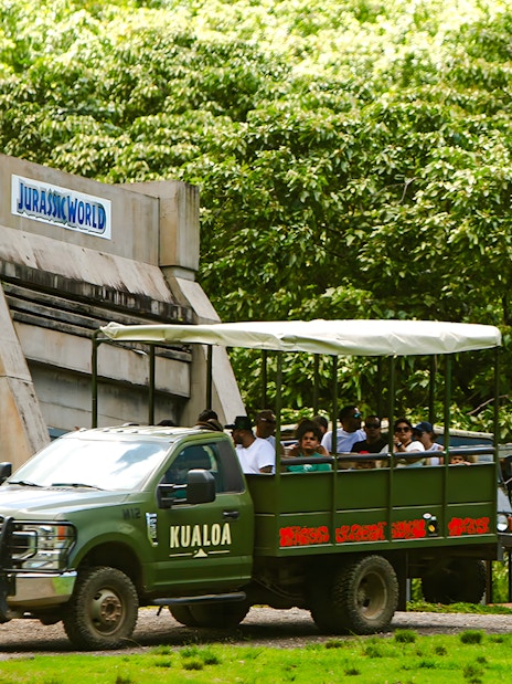 Tour group on a Kualoa Ranch vehicle near Jurassic World set, Jurassic Adventure Tour, Hawaii.