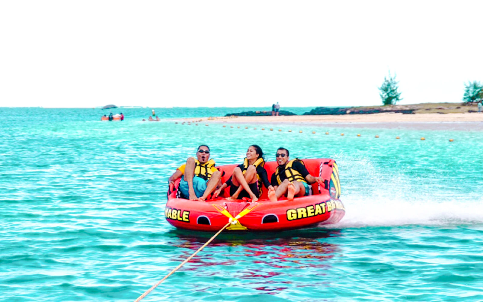 Catamaran Cruise to Ile aux Cerfs with Parasailing, Tube Riding, Lunch & Drinks Image 2