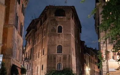 Old building at night on a haunted ghosts tour in Rome.