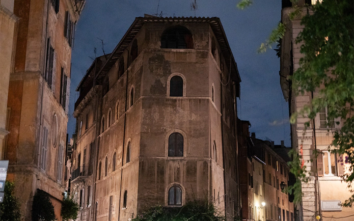 Old building at night on a haunted ghosts tour in Rome.