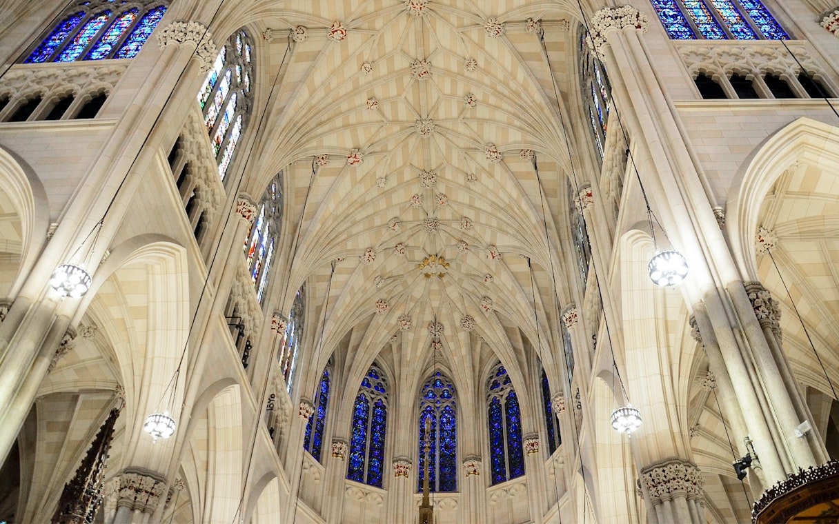 St. Patrick's Cathedral interior ceiling with stained glass windows, New York City.