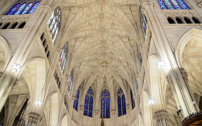 St. Patrick's Cathedral interior ceiling with stained glass windows, New York City.