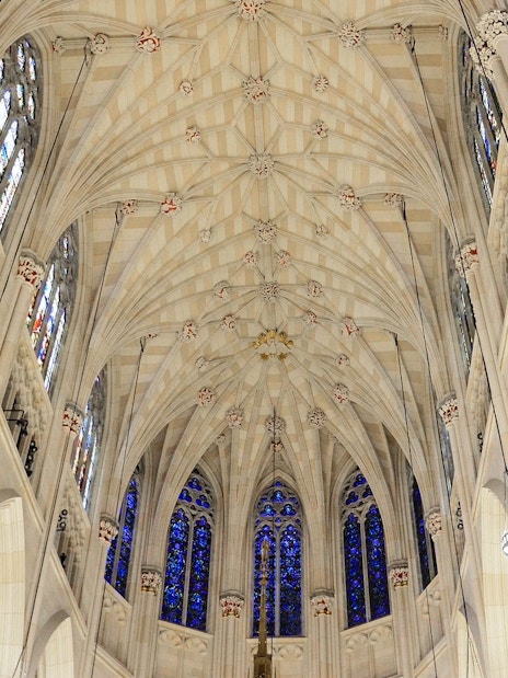 St. Patrick's Cathedral interior ceiling with stained glass windows, New York City.