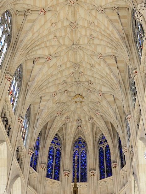 St. Patrick's Cathedral interior ceiling with stained glass windows, New York City.