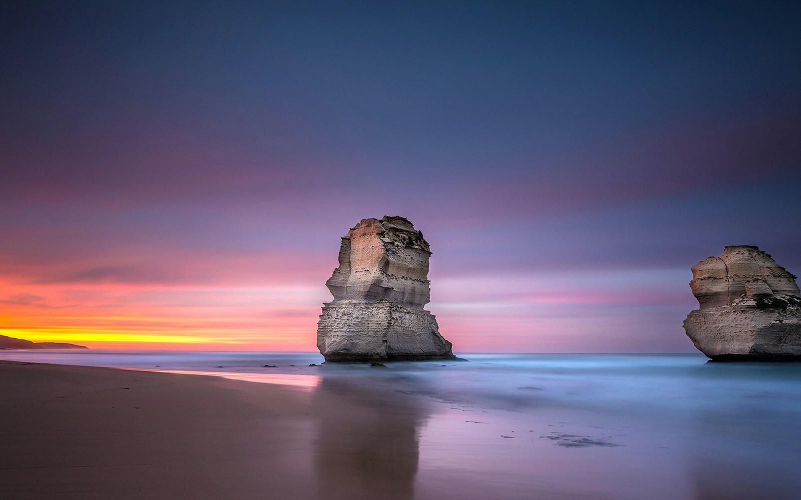 Two of the twelve apostles at sunrise from Gibsons beach, Great Ocean Road, Victoria, Australia