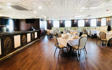 Elegant dining area on the CITY of NEW ORLEANS riverboat, New Orleans.