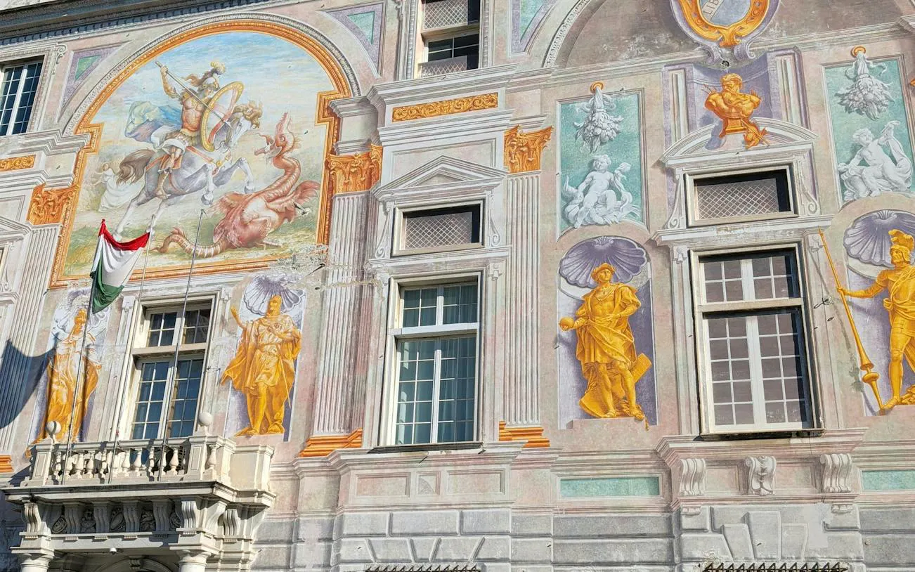 Frescoes on Palazzo San Giorgio facade in Genoa, part of the self-guided city exploration game.