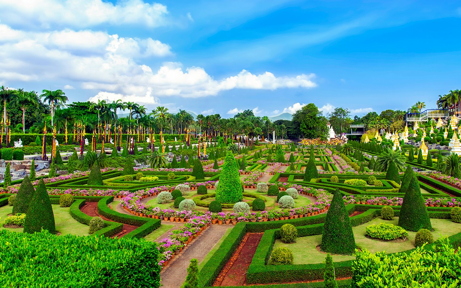 Nong Nooch tropical garden in Pattaya featuring a meticulously designed French garden landscape.