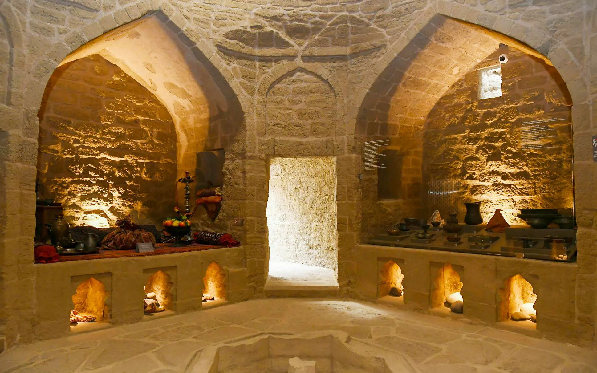 Underground Hamam in Baku with stone arches and traditional decor.